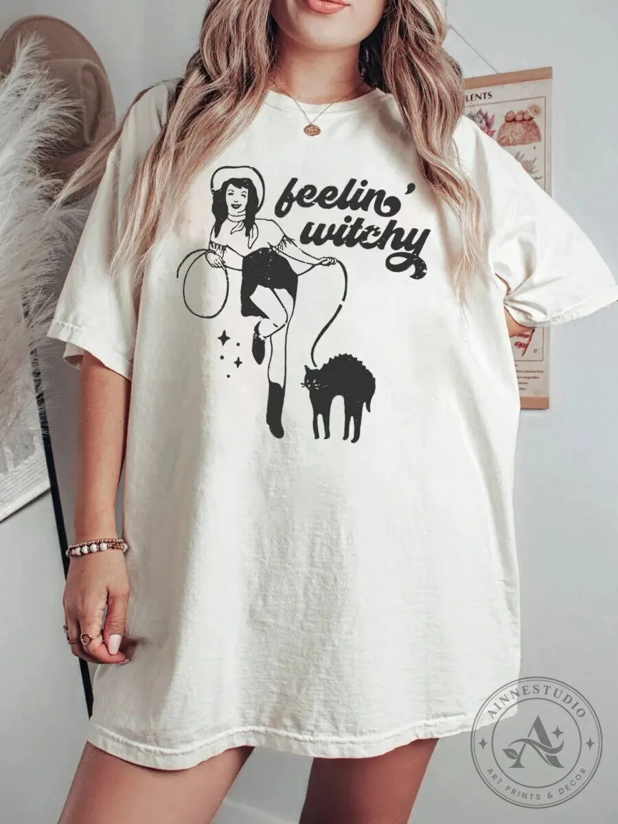 Feelin' Witchy Cowgirl with Black Cat Halloween Graphic T-Shirt